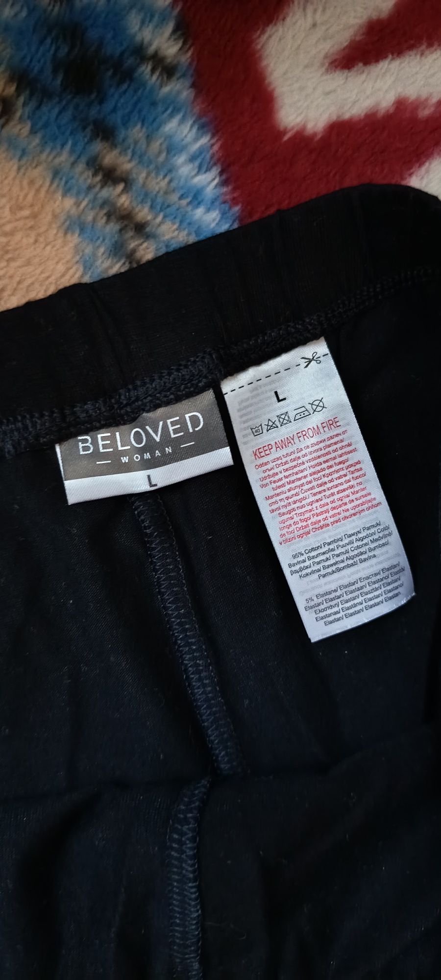 Czarne legginsy L