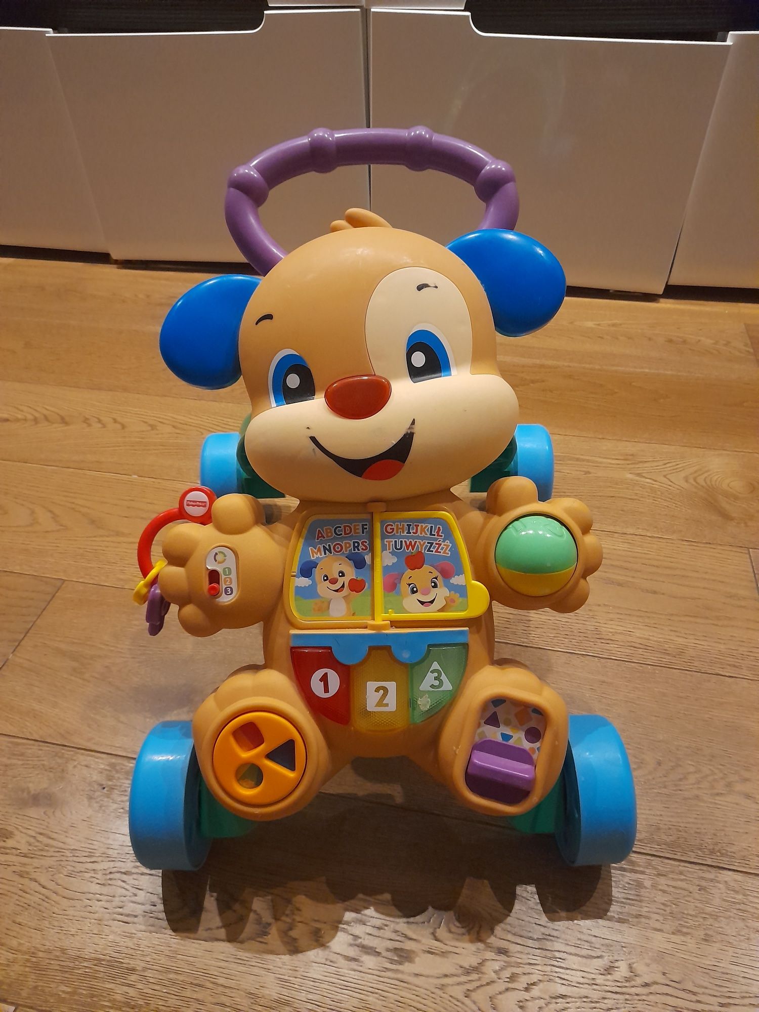 Sprzedam chodzik-pchacz Szczeniaczek, Fisher Price, 12m+