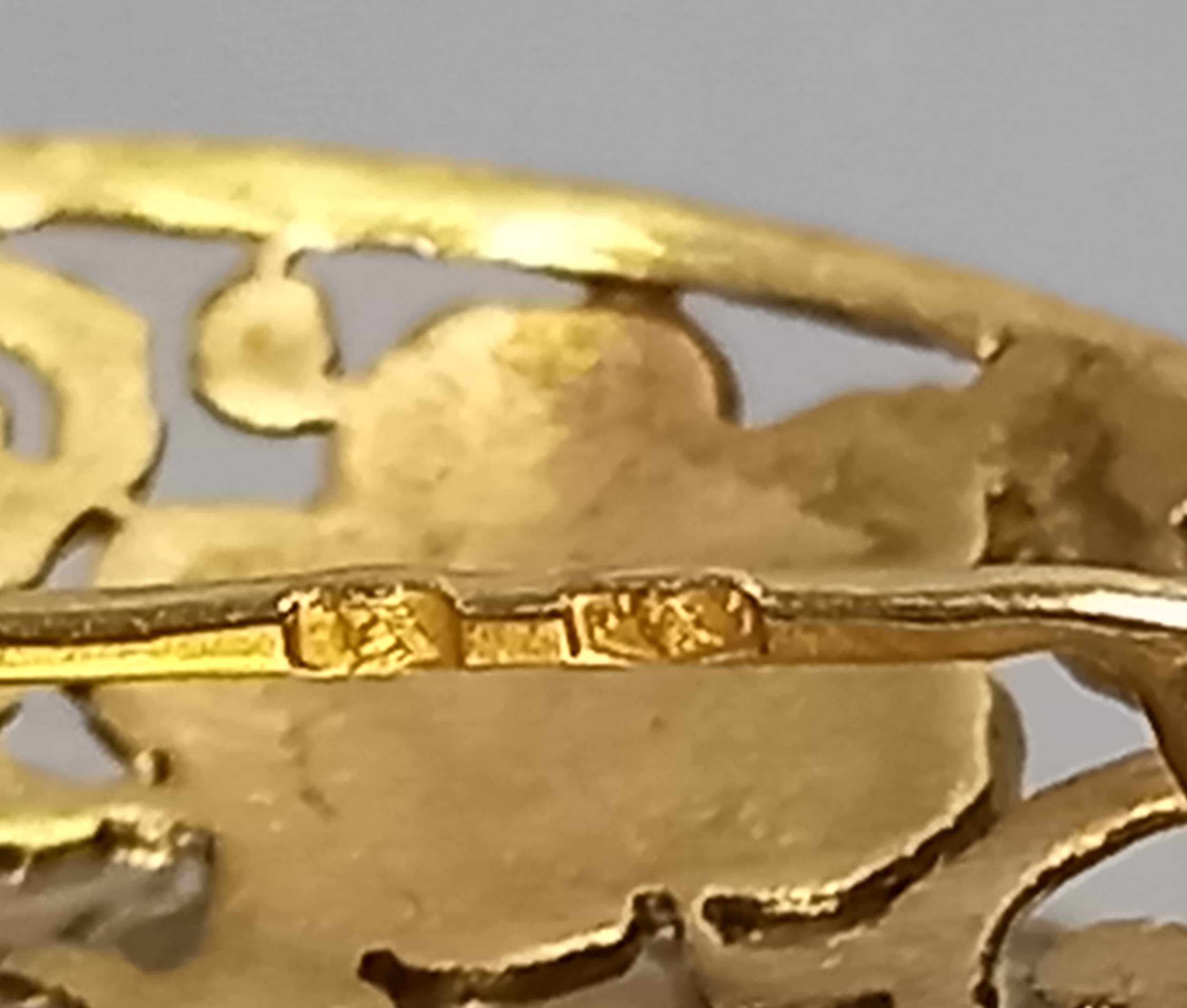 Ażurowa, grawerowana broszka, poł. XX w. złoto 14K