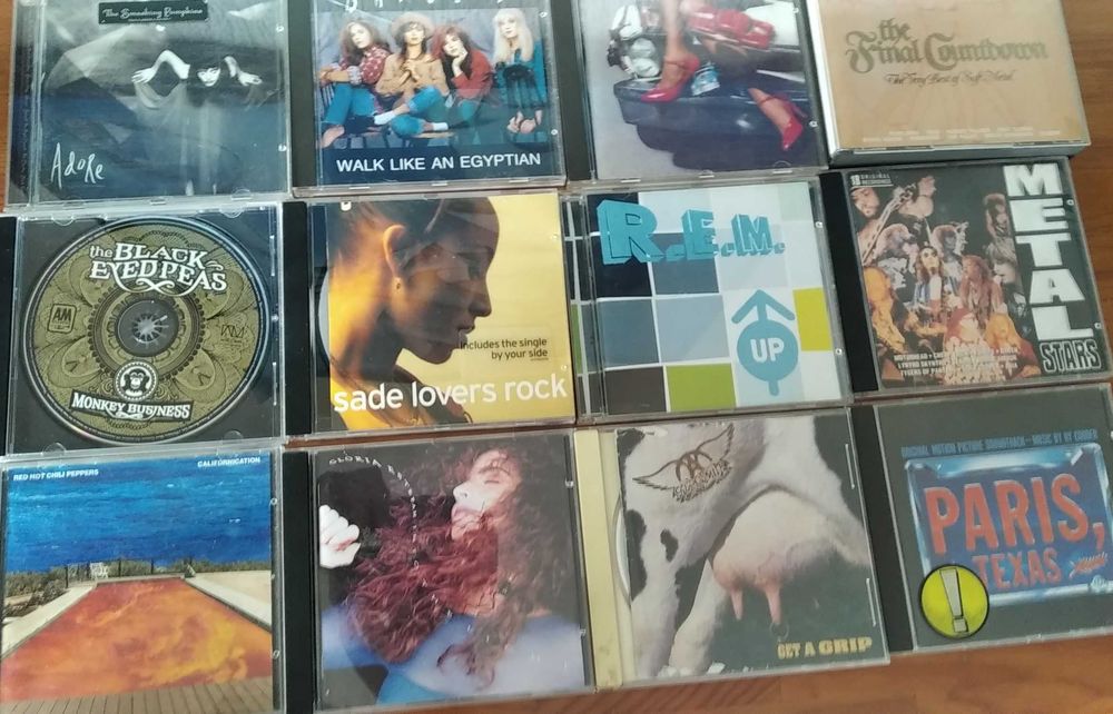 CDs; Bryan Adams, Beatles, Genesis, Roger Waters, Skunk Anansie, Sade
