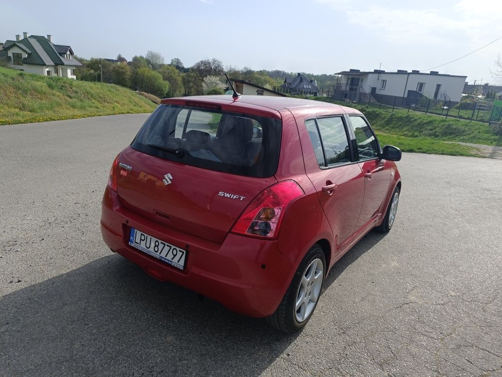 Suzuki Swift 5d 1,3b klima grzane fotele dwa kpl kół prywatne