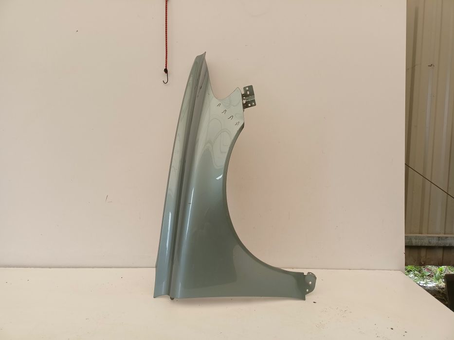 Volvo C70 II 2 06- błotnik prawy przód przedni