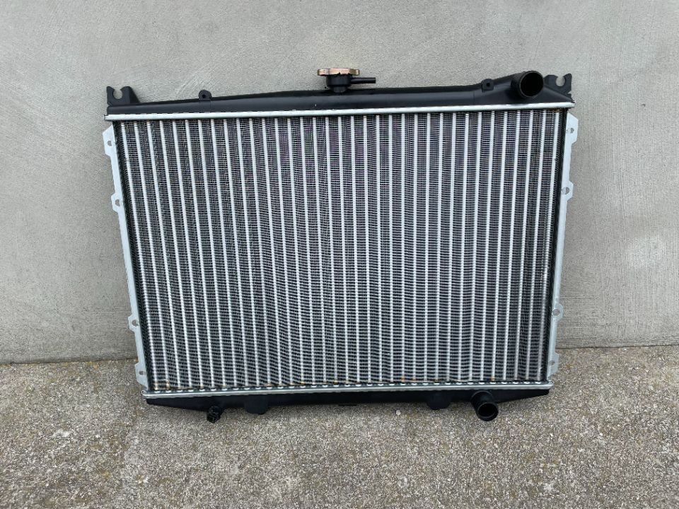 CHŁODNICA WODY NISSAN PICK UP, KING CAB D21 86-- NOWA 2,4i12V
