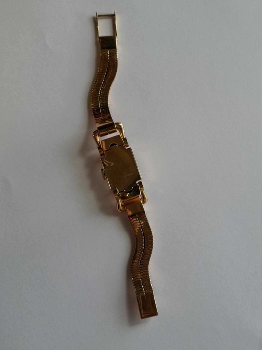 Relógio de corda todo em ouro e diamantes