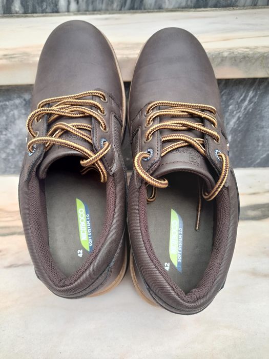 Sapatos/botas novos