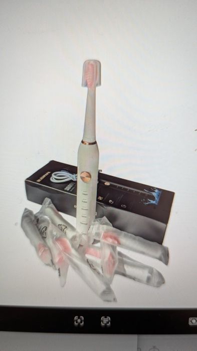 Електрична зубна щітка