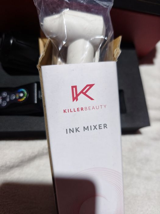 Maquina de tatuar em perfeito funcionamento .