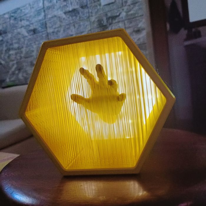 Luz de presença, mão