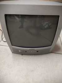 Vendo TV modelo antigo, com suporte parede.