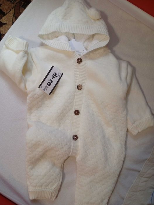 Новий комбінезон 9м