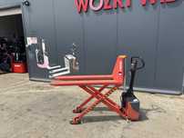 Paleciak nożycowy wózek elektryczny 1500 kg 60 cm jak Nowy