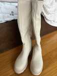 Botas beige cano alto