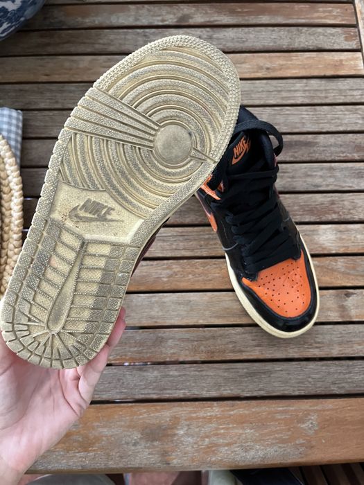 Jordan 1 Mid Laranja Preto