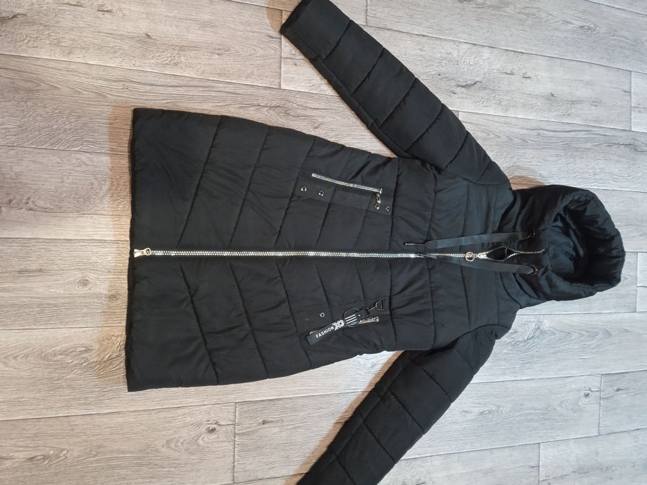 Продам жіночий пуховик