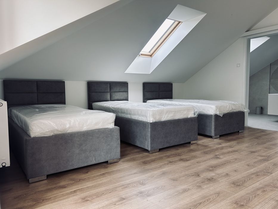 Łóżka tapicerowane na wymiar – solidne, eleganckie, nowoczesne