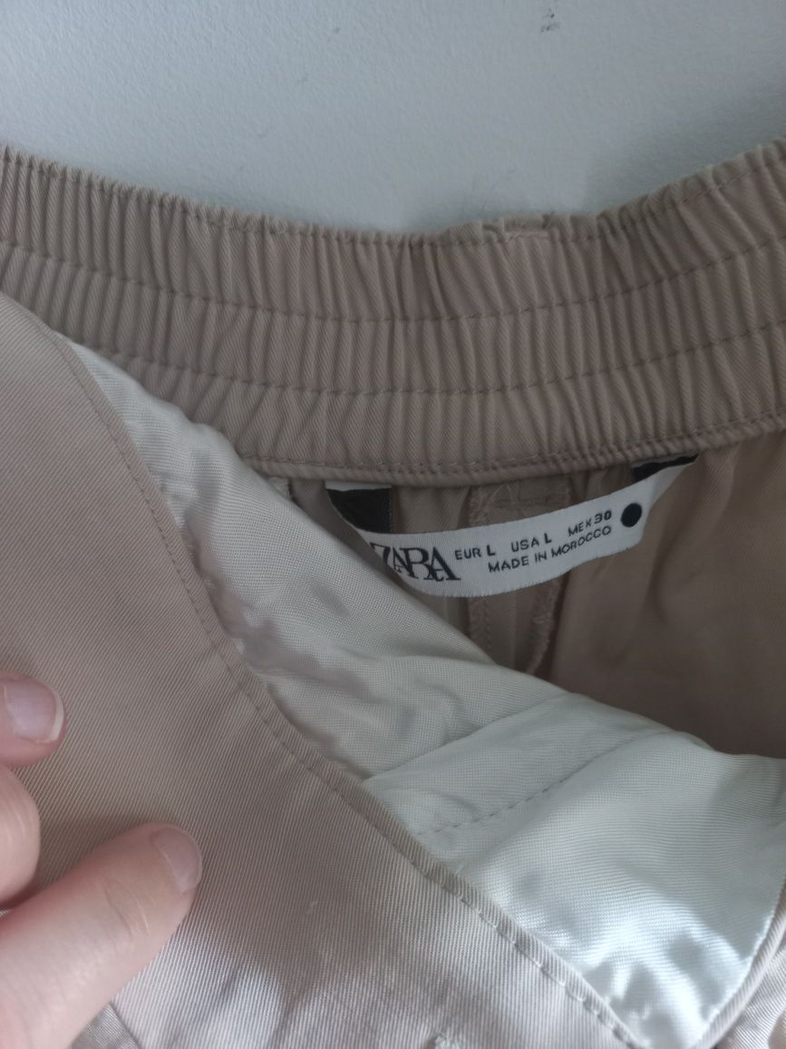 Beżowe eleganckie spodnie Zara rozmiar L