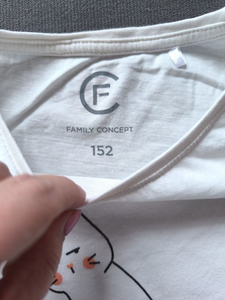 Jak nowy. T-shirt r. 152