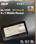 Маршрутизатор ASUS WL-330N - 5-в-1 мобільний Wi-Fi роутер
