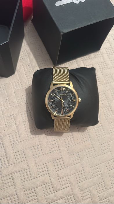 Relogio police dourado