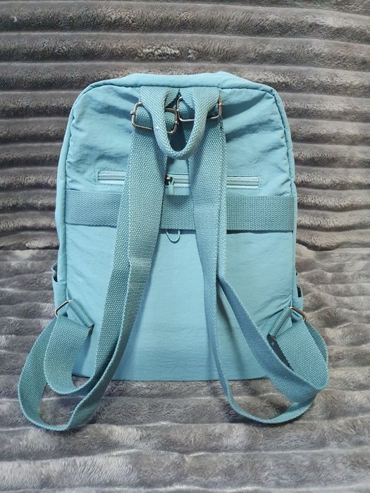Mochila azul claro impermeável NOVA – ideal para viagem ou dia-a-dia