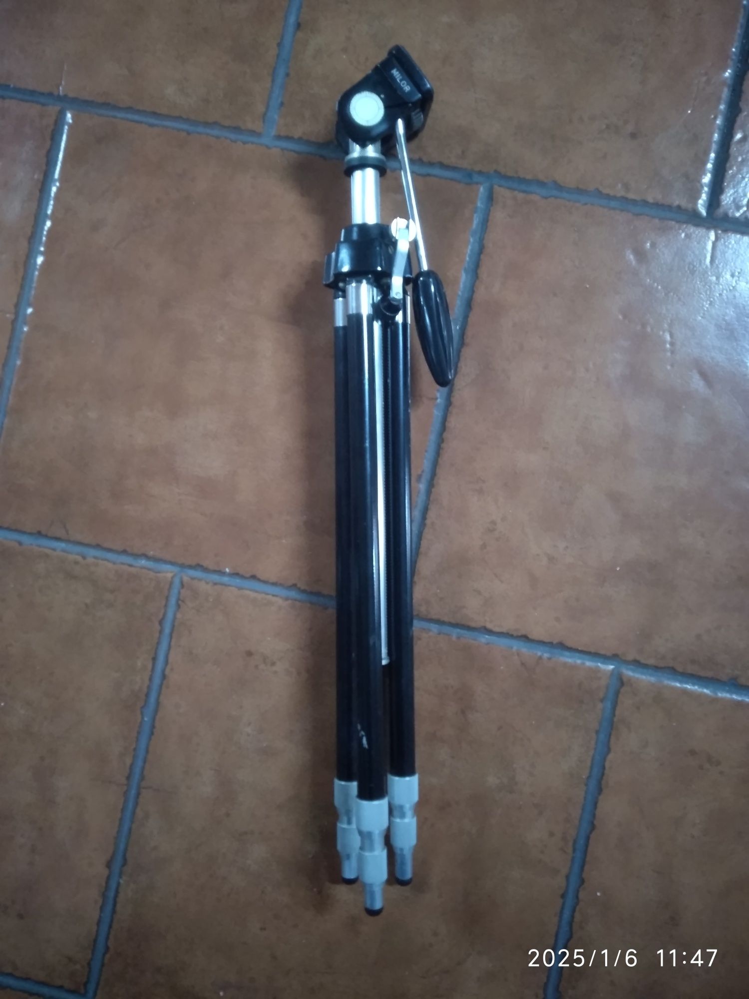 Tripé para máquina fotográfica
