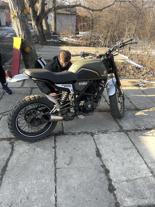 Скраблер 250 куб.  Хоть и 3100 пробіг но как новый