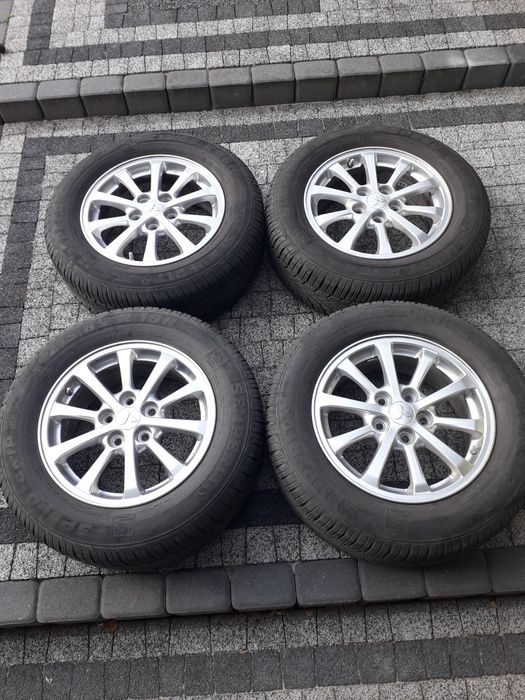 4 x Alufelgi 5x114.3 16x6 1/2 J z oponami zimowymi 215/65 R16