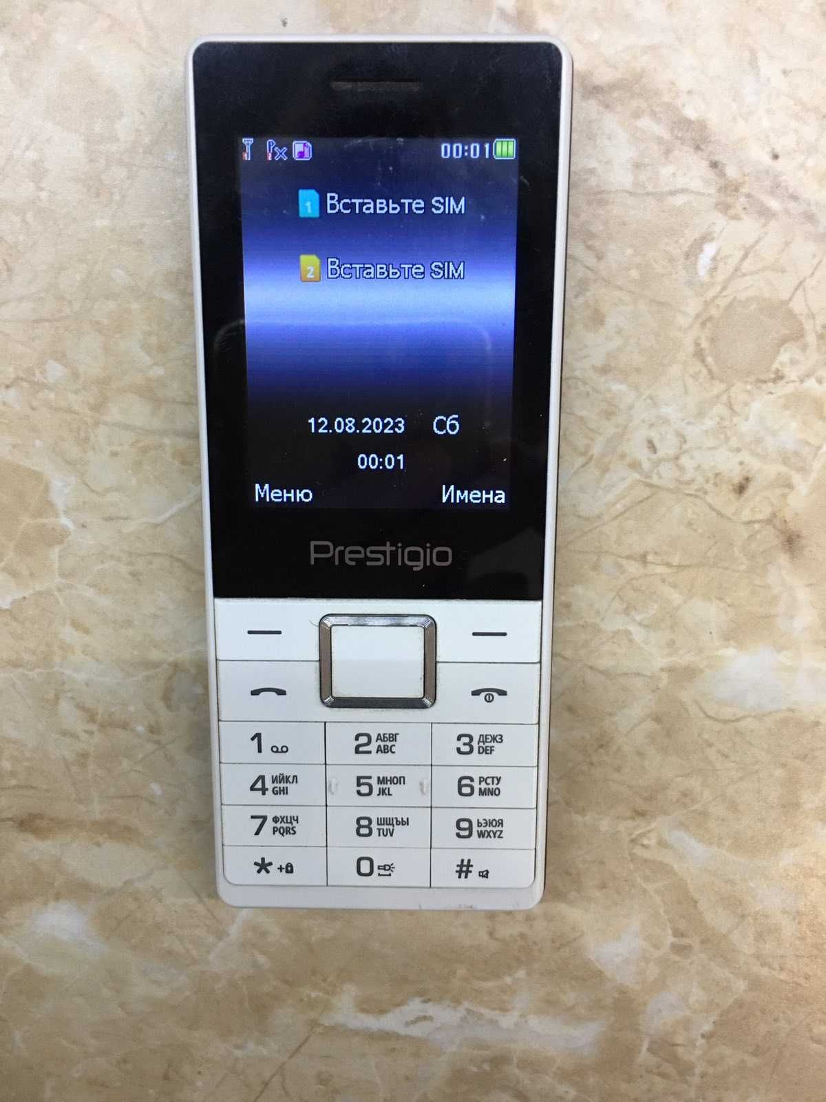 Кнопочный мобильный телефон на 2 SIM с камерой Prestigio Muze A1 white