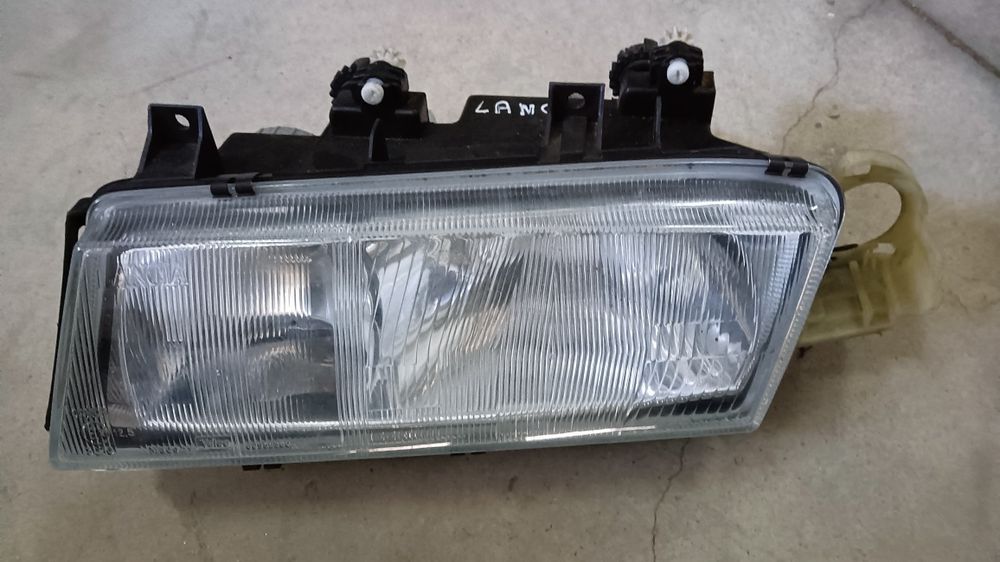 Ótica Lancia delta farol original óptica esquerda