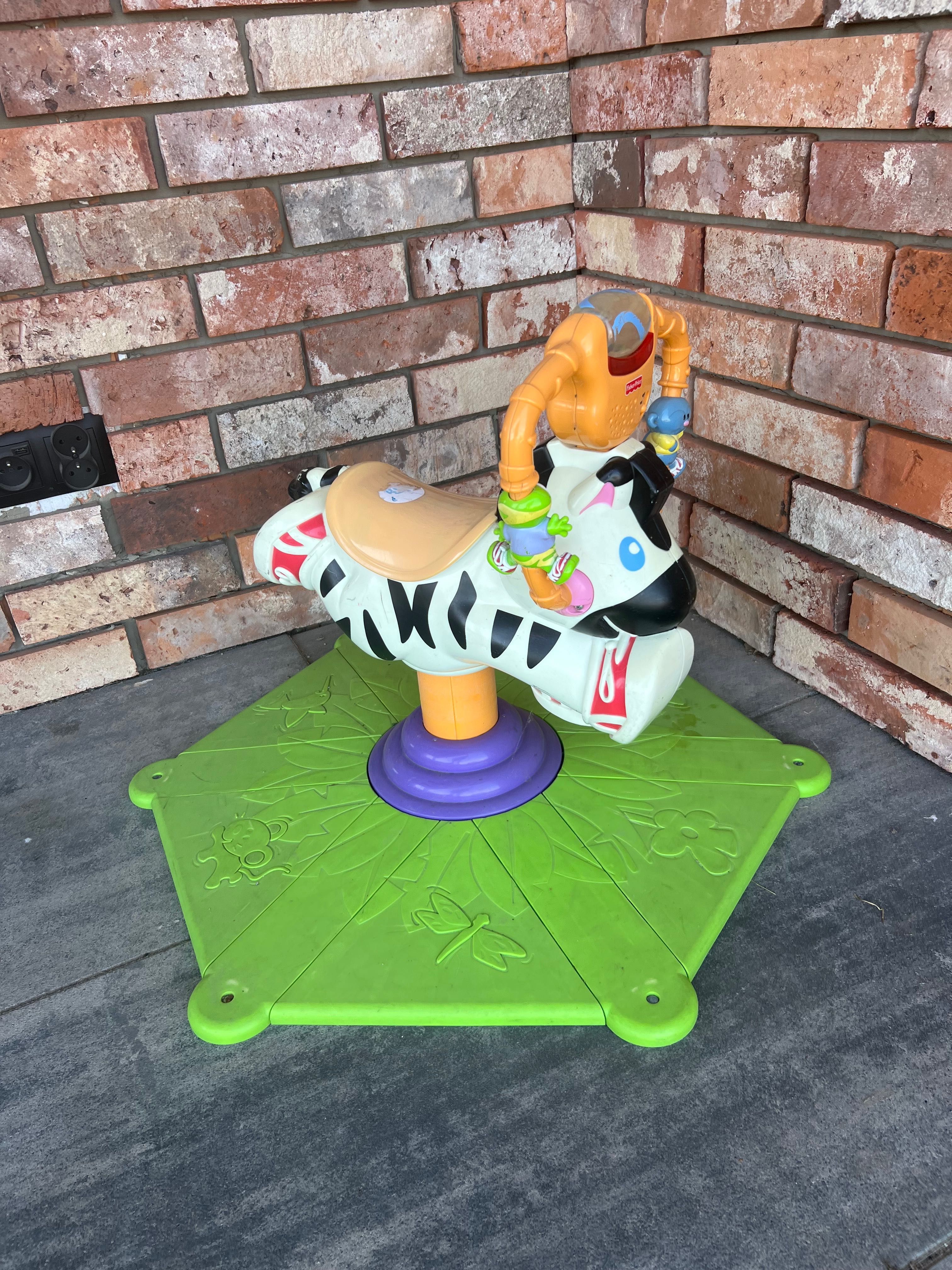 Skoczek zebra fisher price