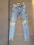Spodnie jeansowe dziurawe 34 XS szarpane