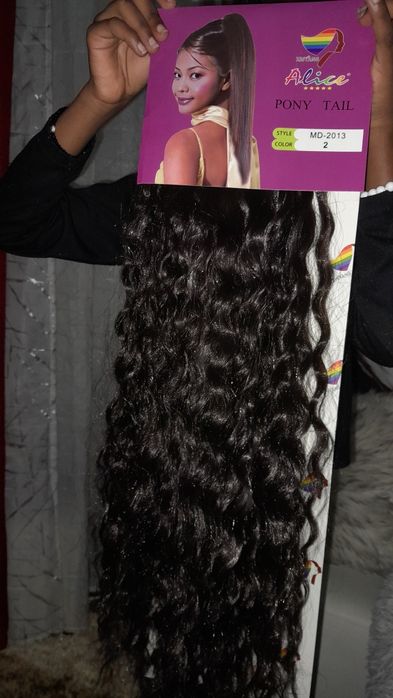 Rabo de cavalo bastante longo