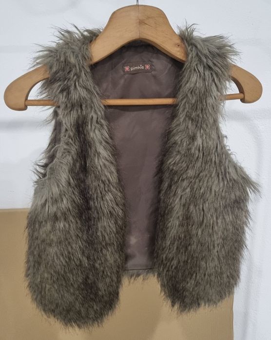 Casaco de Mulher não é novo em bom estado