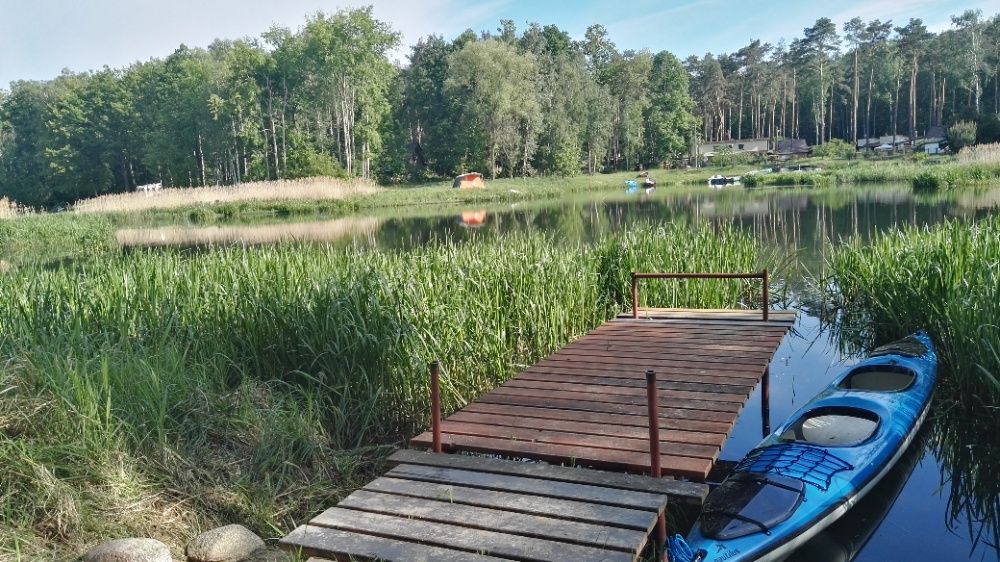 Domek Milena w Turawie z linią brzegową.