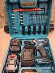 Гайковерт аккумуляторный Makita DTW301с набором головок