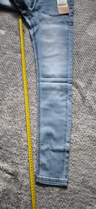 Nowe spodnie jeansowe coccodrillo r. 164