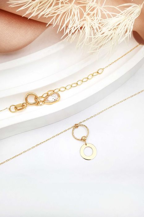 Złota celebrytka z dwoma kółkami i błyszczącym koralikiem pr. 585