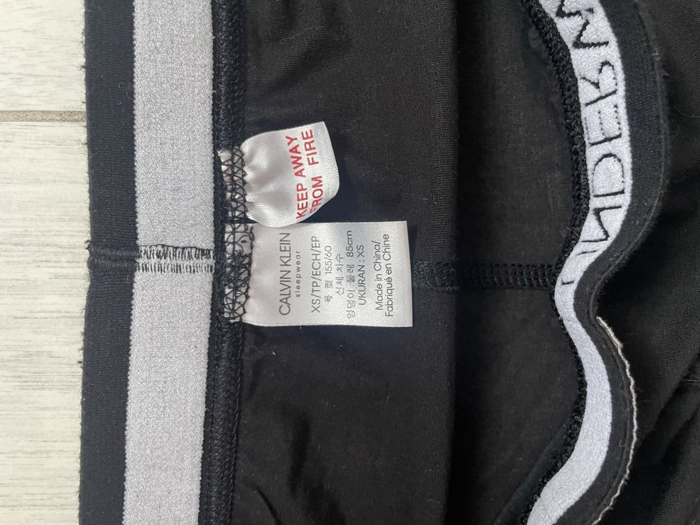 Legginsy spodnie damskie czarne bawełniane Calvin Klein XS 34