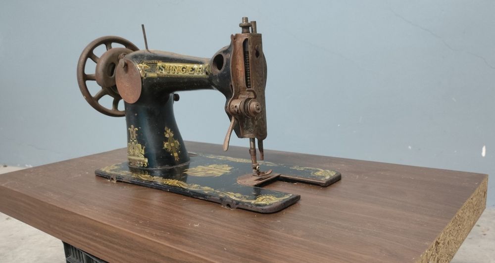 Cabeça de máquina de costura Singer