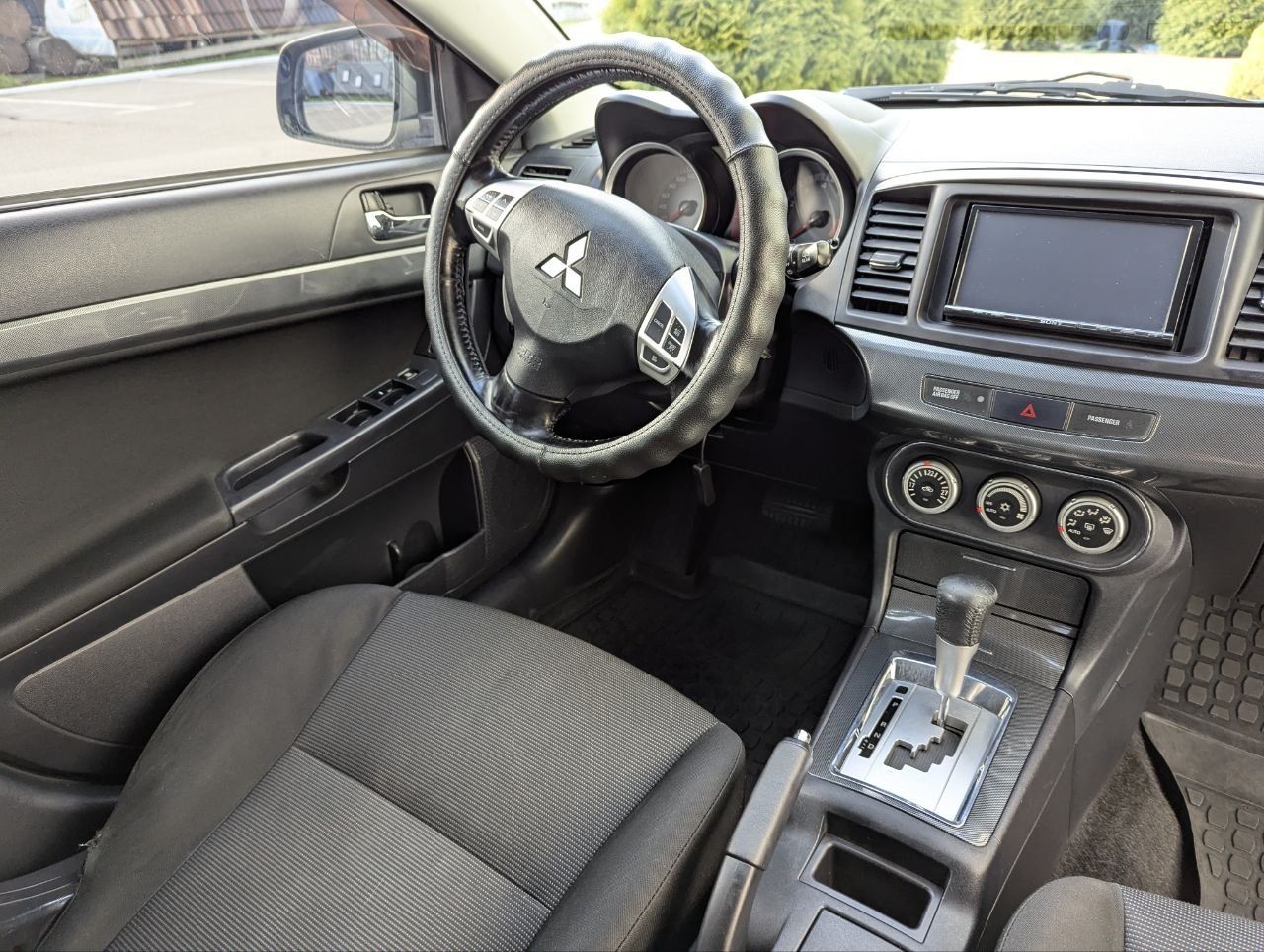 Mitsubishi lancer хетчбек 1.8 АКП газ.