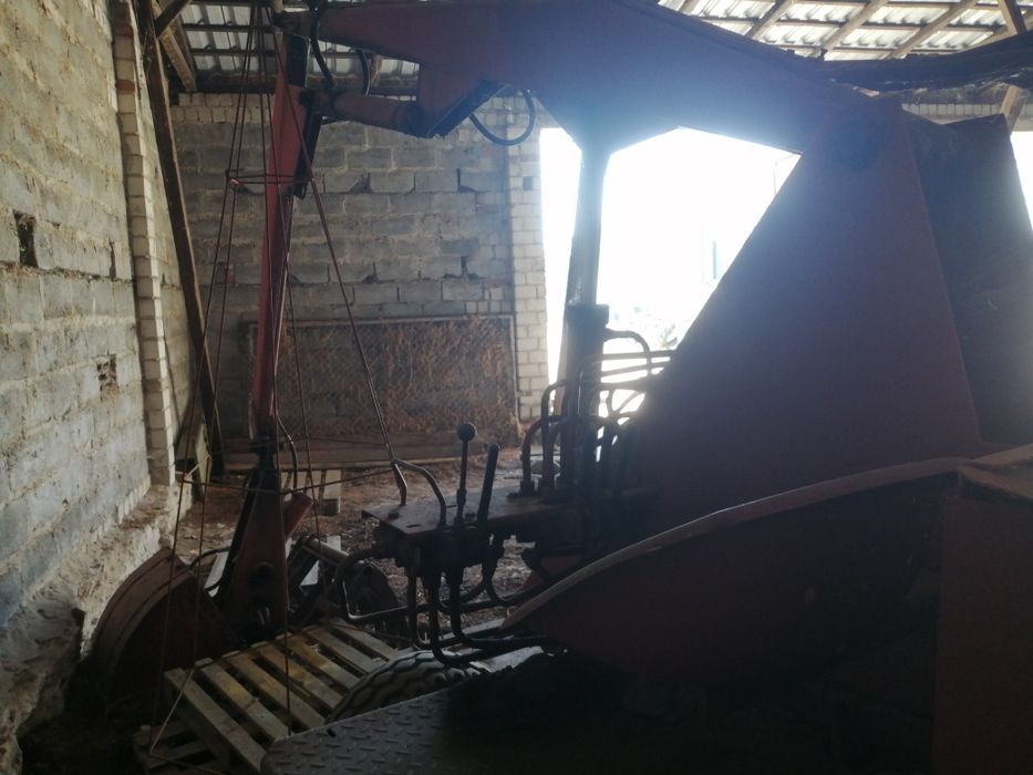 Ładowacz cyklop chwytakowy garażowany