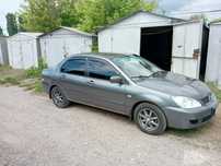 Продам свій Mitsubishi Lancer 9