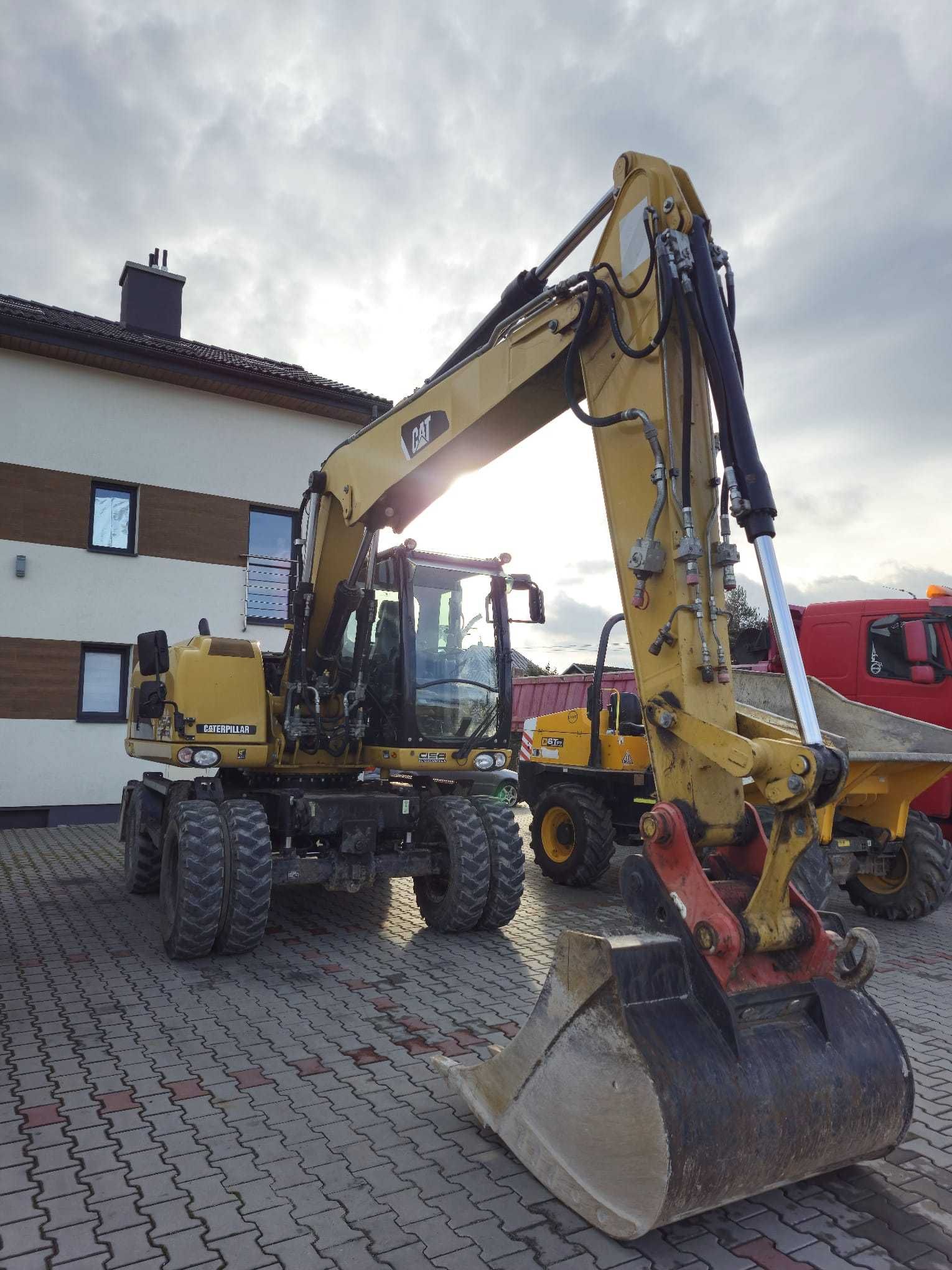 KOPARKA KOŁOWA marki CAT TYP M313D  150zł/h