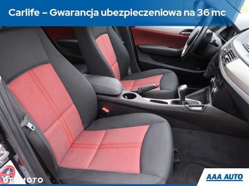 Fotele, boczki drzwi BMW E84, BMW X1