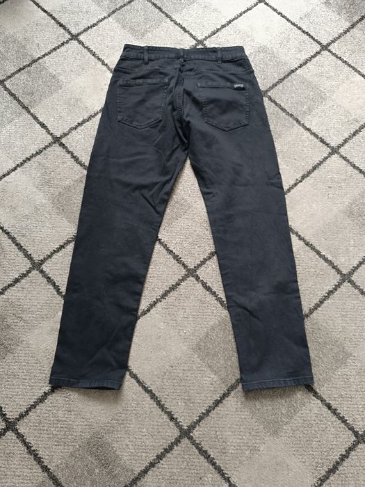 Czarne spodnie regular marki Cropp rozmiar 30/S