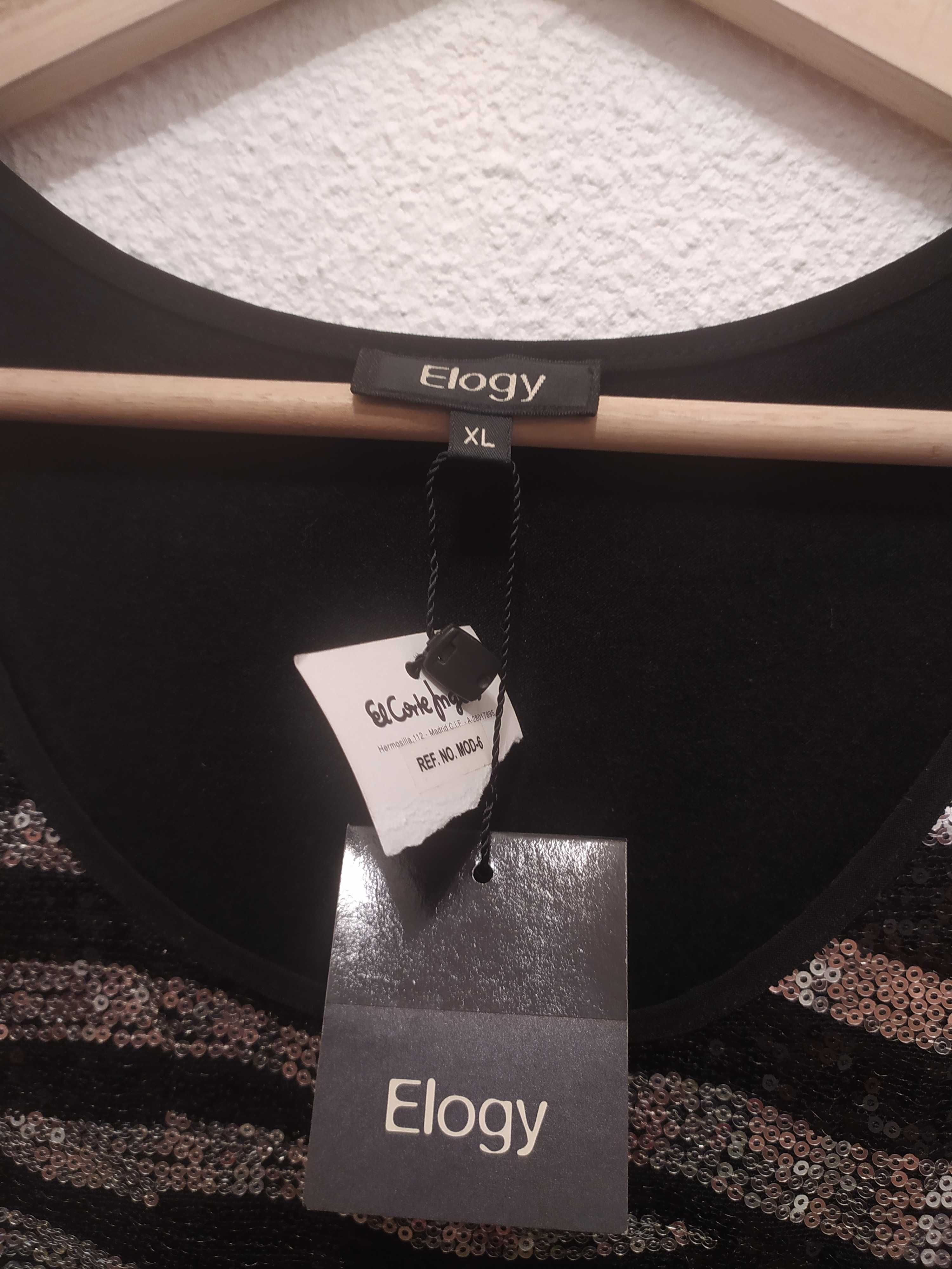 Vestido de lantejoulas, preto e prata.
Marca: Elogy
Tam: XL