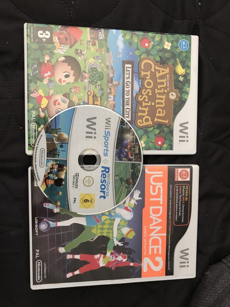 Wii com acessórios e 3 jogos