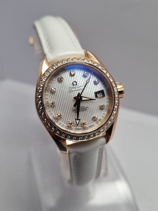 Золотые часы Omega seamaster