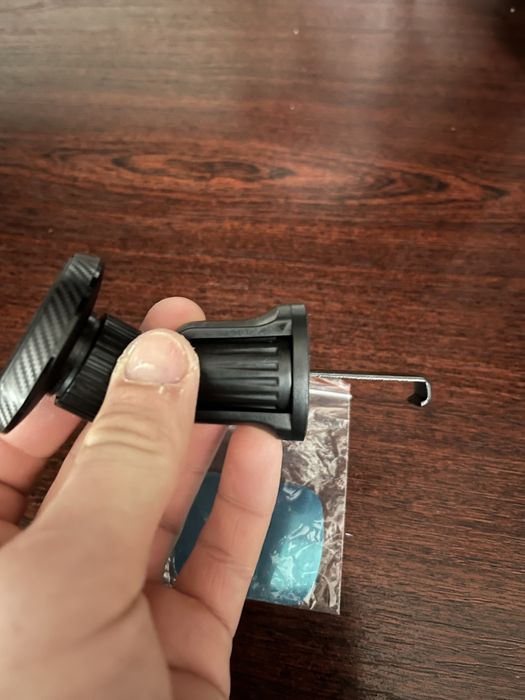 Продам тримач новий