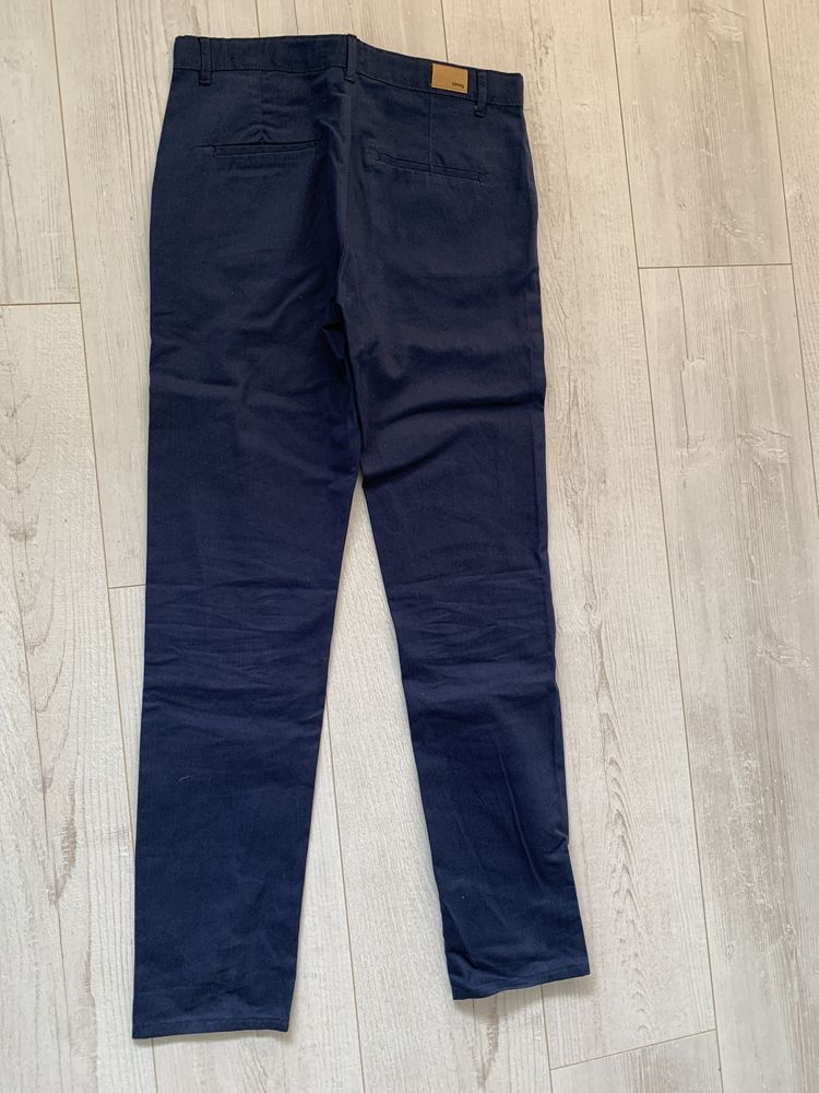 Nowe z metką spodnie jeansowe 158